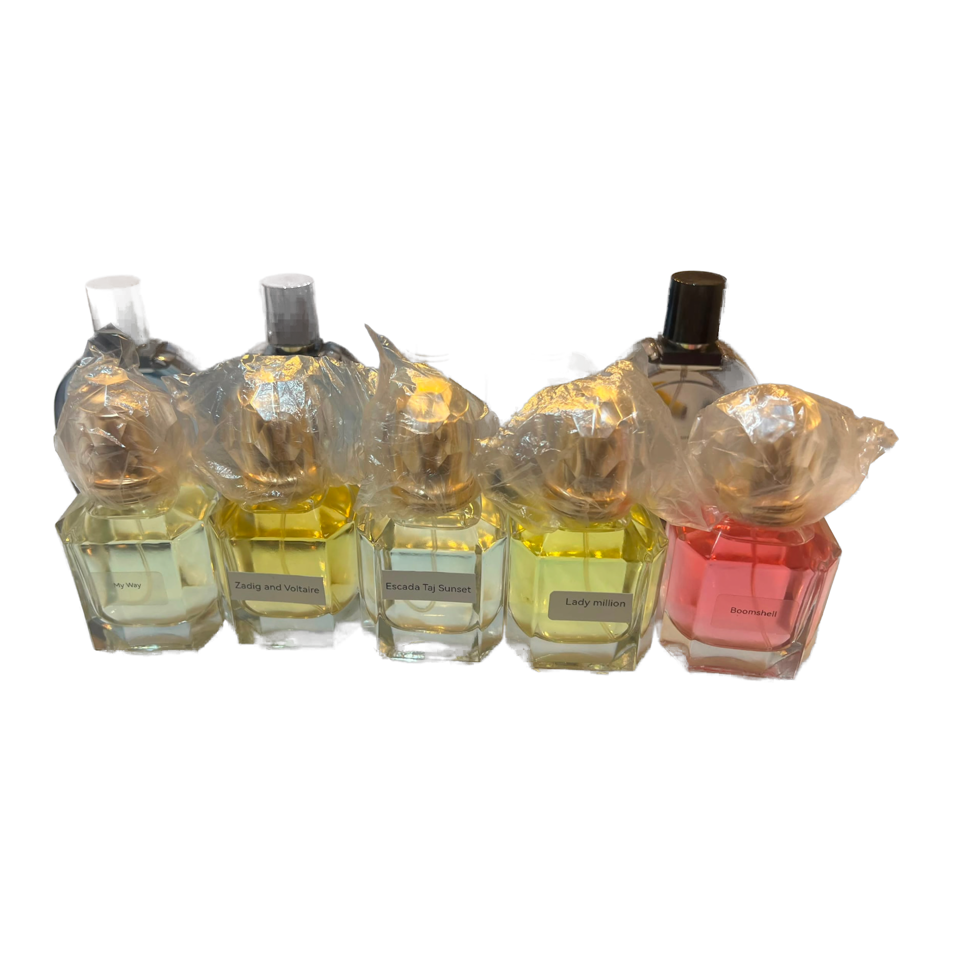 Hill Scents luxury perfume bundle displayed together under golden light